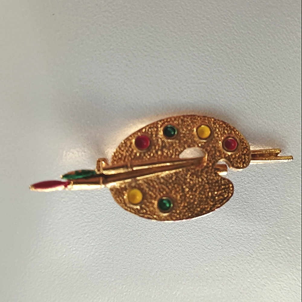 Painter's Gold Tone Broach Signed Gerrys